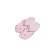 Pair of light pink toe post flats slippers with ridged soles