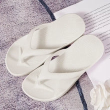 White toe post flats slippers in coral, black, and light pink with rubber sole