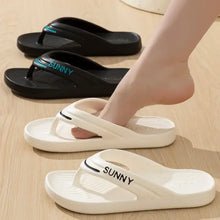 Four black and white toe post flats slippers with two Sunny prints