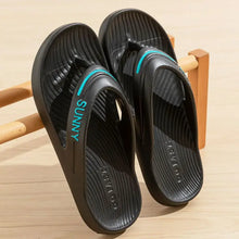 Black toe post flats slippers with teal accents