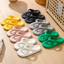 Rows of colorful toe post platform slippers with thick soles