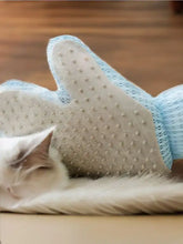Touch Pet Hair Remover Glove with light blue mesh and silicone nodules
