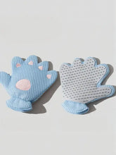 Touch pet hair remover glove with light blue paw-print, pink accents, silicone nodules