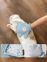 Touch Pet Hair Remover Glove with light blue silicone nodules and pink paw prints