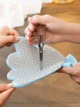 Touch Pet Hair Remover glove with light blue silicone nodules