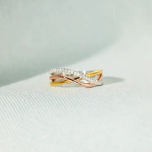 Tri-color intertwined sterling silver ring with diamonds