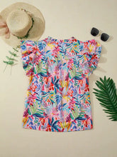 A vibrant tropical floral print off-the-shoulder blouse with a notched neck and ruffled short sleeves in pink blue green and yellow