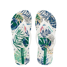 Pair of white tropical leaf print summer slippers