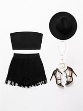 Back view of Tube Top and Fringe Shorts Set with black fringe shorts, high-waisted elastic waistband, and flowing tassels