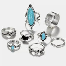 Turquoise alloy 8-piece ring set with silver-toned bands and turquoise stones