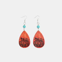 Turquoise wooden pumpkin teardrop earrings with carved design