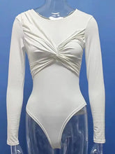 A sleek off-white long sleeve bodysuit with a twisted front detail designed for stylish everyday wear