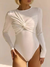 A sleek white long sleeve bodysuit with a ruched twisted front design perfect for stylish layering