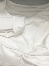 White long sleeve cotton bodysuit with twist front detail and neatly stitched cuffs in soft fabric sheen
