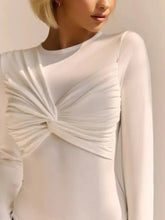 White long sleeve bodysuit with sheer ruched fabric and twisted knot detail at center front for stylish wear