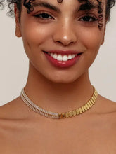 Woman wearing 18k gold-plated zircon choker necklace with split design