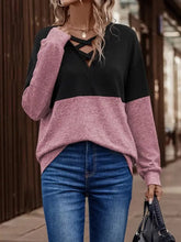 Women’s long-sleeve two-tone crisscross V-neck sweatshirt in black and dusty rose