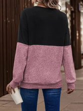 Two-tone long-sleeve crisscross detail sweatshirt in black and heathered pink