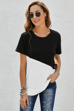 Women’s black and white round neck tee with short sleeves