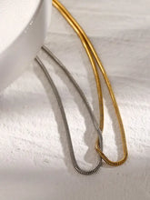 Gold-plated stainless steel two-tone snake chain necklace with silver accents