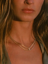 Delicate gold-plated stainless steel snake chain necklace with interlocking loop