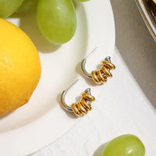 Two-tone stainless steel 18k gold-plated hoop earrings with silver accents