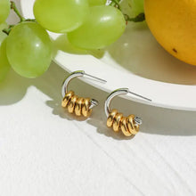 Two-tone stainless steel 18k gold-plated hoop earrings with spiral design