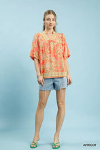Umgee apricot floral boho blouse with apricot paisley print and short puffed sleeves for casual wear