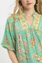 Umgee apricot floral boho blouse mint-colored with floral print in yellow orange and pink on lightweight fabric