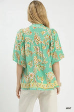 Umgee apricot floral mint blouse with yellow orange pink floral print puffed sleeves and ruffled hem