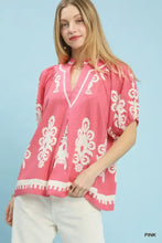 Pink umgee boho print blouse with white embroidered floral patterns short sleeve and v-neck split neck design