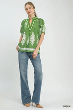 Green embroidered boho print blouse with white floral patterns short sleeve and v neck split neck design
