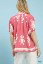 Umgee boho print short sleeve split neck top in pink with white floral embroidery and decorative trim on neckline and hem