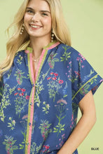 Umgee botanical floral button front top blue short-sleeved blouse with vibrant pink and green floral button pattern