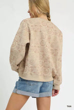 Tan umgee coin stamp print sweatshirt with repeating circular coin stamp pattern long sleeves and ribbed cuffs