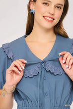 Blue Umgee collared short sleeve button down romper, machine wash cold