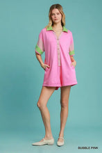 Umgee pink romper features bubble design, lime contrast trim, button front, machine wash cold