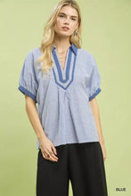 Blue and white striped short-sleeved blouse with navy contrast trim v-neckline umgee contrast trim popover stripe top