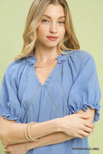 Light blue umgee cotton gauze ruffle top with textured fabric puff sleeves and ruffled neckline
