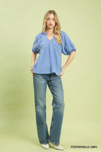 Light blue umgee cotton gauze ruffle top with textured fabric puffed sleeves and v neckline cotton gauze ruffle blouse
