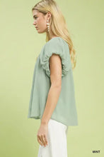 Mint-colored lightweight umgee crinkle flutter sleeve peasant top with ruffled flutter sleeves and flowing silhouette