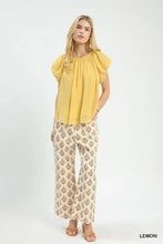 Yellow umgee crinkle flutter sleeve peasant top with short puffed sleeves and gathered neckline