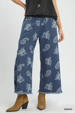Umgee denim paisley wide-leg pants in indigo denim with white paisley print and frayed hems are stylish culottes