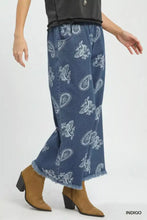Indigo umgee denim paisley wide-leg pants with white paisley print and frayed hems in a relaxed fit