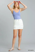 Umgee white distressed raw hem high waist denim mini skirt made of denim with a casual worn look