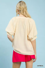 Umgee oatmeal-colored embroidered puff sleeve blouse with loose fit gathered neckline and puffed sleeves