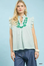Light blue and white striped sleeveless top with green leaf embroidery and ruffle sleeves umgee embroidered ruffle sleeve top