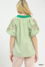 Light green umgee embroidered stripe blouse with pink and green floral sleeves and contrasting teal collar