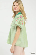 Light green and white embroidered stripe blouse with pink floral embroidery on sleeves umgee embroidered stripe top