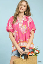 Pink floral border boho blouse with puff sleeves and ruffled collar by Umgee, featuring smocked v-neck detail